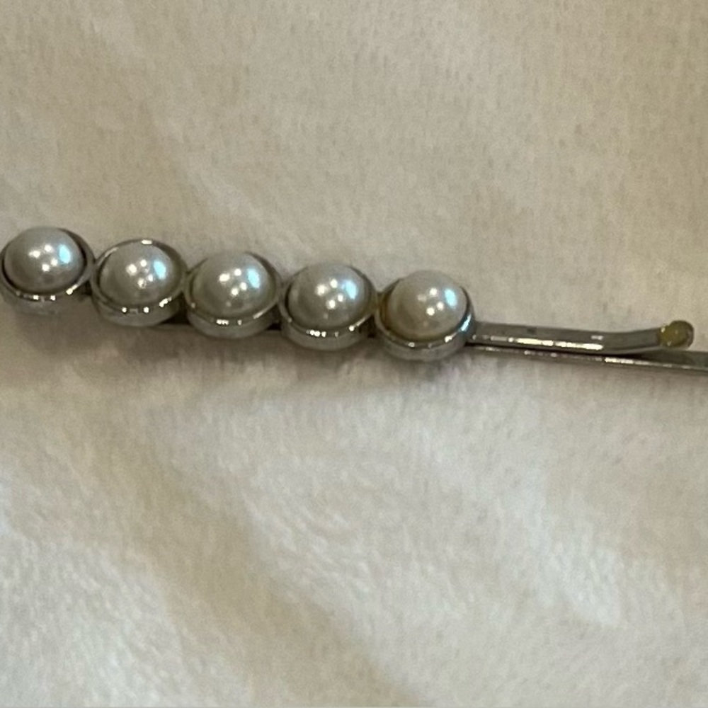 Faux pearl barrette. Approximately 2”. Silver and White.